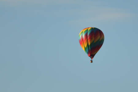 color balloon flight high above the cityの写真素材