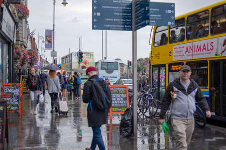 Dublin,Ireland - JULY 30, 2019: People Walking on Dublin City center crowded streetsのeditorial素材