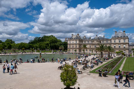 PARIS, FRANCE - JUNE 6, 2022: Tourists relaxing in Luxembourg Garden (Jardin du Luxembourg),second largest Public Park in Paris.のeditorial素材