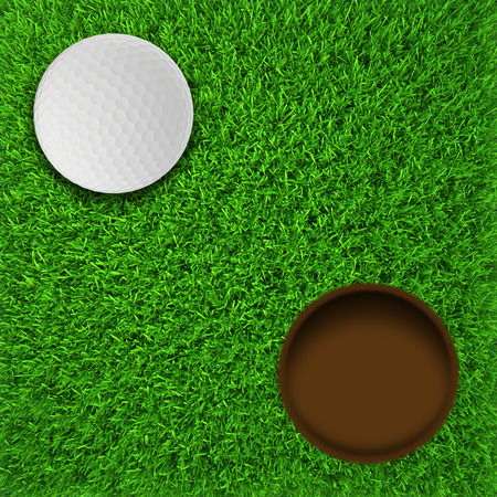 golf ball hole on a field  golf ball on lip of cup  realistic grassの写真素材