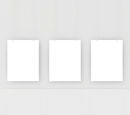 paper card on a white wall  white blank paperの写真素材