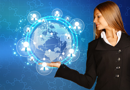 woman showing holding on world map and teamwork people iconの写真素材