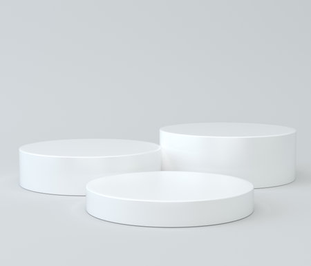 Abstract white 3D studio with realistic white cylinder pedestal podium set and shadow overlay. Minimal scene for product display presentation. Stage for showcaseの写真素材