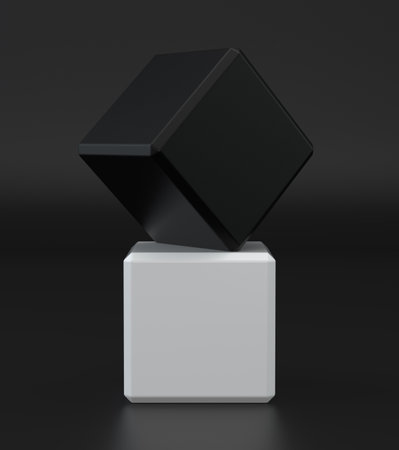 White and black cube with glossy texture on isolated dark background.の写真素材
