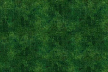 green textured background batik cloth pattern with spots.の写真素材