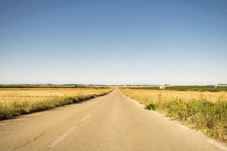 landscape of straw fields and road