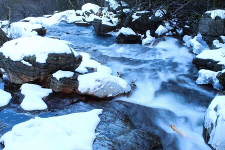 small river in Norway, Hiking in Norway in winter, Landscape in winter near Moi, Norwayの写真素材