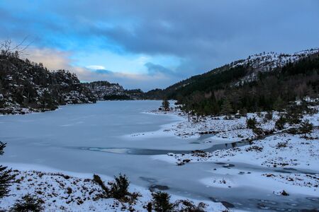 Small lake in Norway, Hiking in Norway in winter, Landscape in winter near Moi, Norwayの写真素材