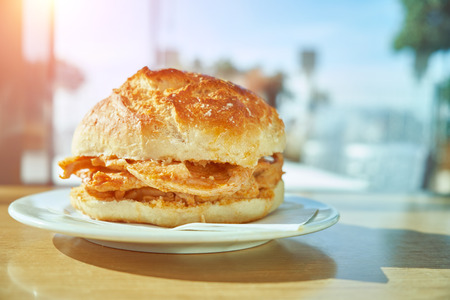 Traditional portuguese pork beef sandwich bifana . Traditional Portuguese foodの写真素材