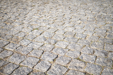 Town center street stone brick pavement in Porto, Portugal.の写真素材