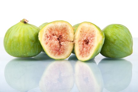 Some ripe figs isolated on whiteの写真素材