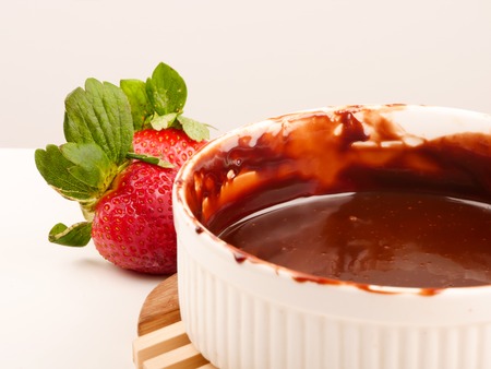 Chocolate fondue with fresh strawberriesの写真素材