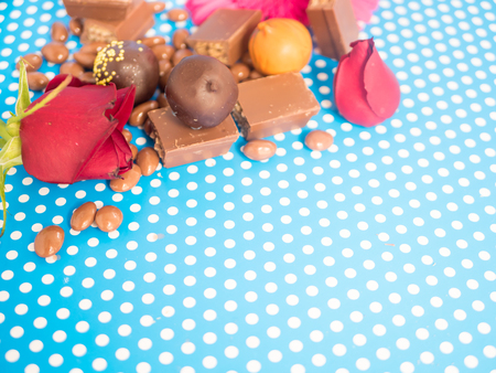 Homemade chocolates on blue background. Chocolate sweets.の写真素材