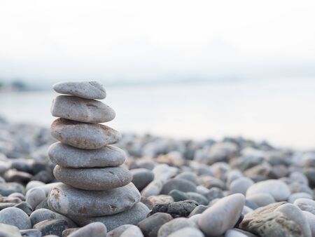 Stacked rounded stones on the beach near Mediterranean sea in Kemer Antalya Turkey.の写真素材