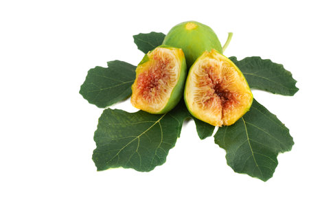 fresh ripe figs on leaf isolated on white background. natural organic food. High quality photoの写真素材