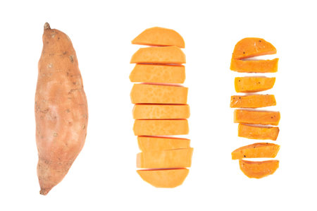 Whole, peeled and baked sweet potatoes isolated on white.の写真素材