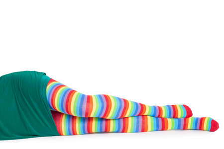 Perfect long female legs in rainbow pantyhose - isolated on white background - Hot sexy legs in stockingsの写真素材