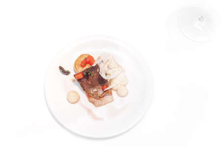 Delicious river fish and Scallop with Fennel on the white plate