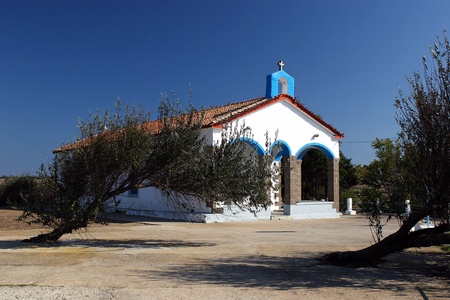 The small white chapel on greek islandの写真素材