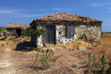 The old abandoned stone house on Lemnos islandの写真素材