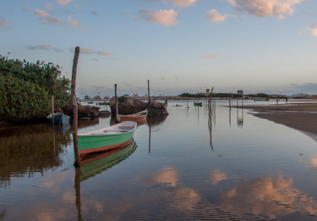 Sunset with boats anchored in Rio da Madre in Guarda do Embau , Santa Catarinaのeditorial素材