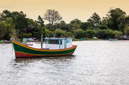 fishing boat on river in rio grande, brazilの写真素材