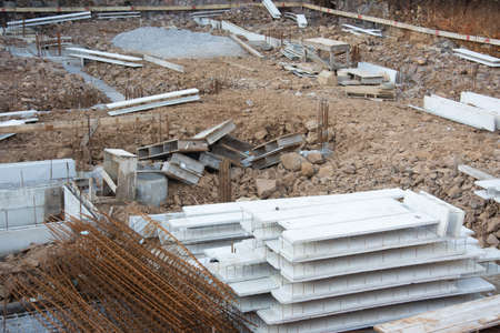the pile of concrete blocks for the construction of the building of the houseの写真素材