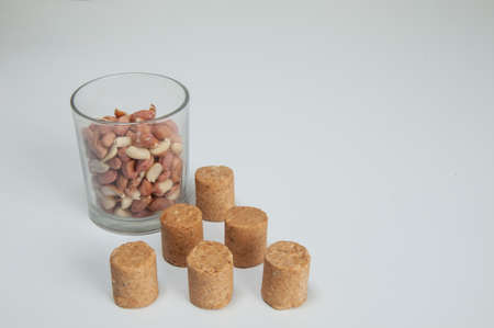paÃ§oquinha and peanuts on top of a white background
