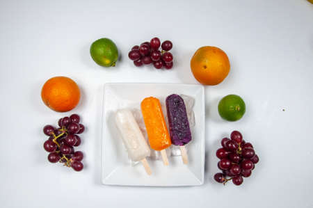 ice cream with fruits on white backgroundの写真素材