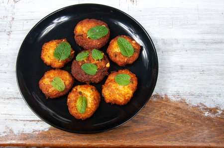 Indian potato dumpling on table