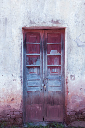 Old wooden door in the old house, closeup of photo.の写真素材