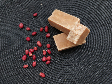 paÃ§oca with peanut on a black background