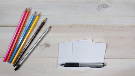 Pencils and paper on wood background. Back to school concept.の写真素材