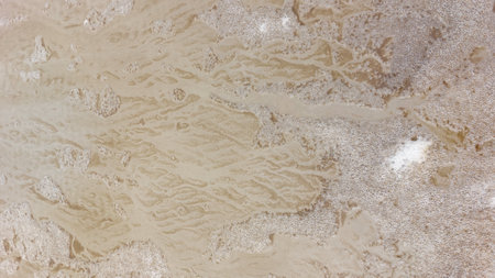 Close-up of the texture of the sand on the beach.の写真素材