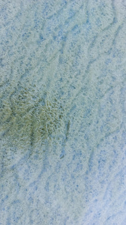 abstract background of blue water ripples on the surface of the sea