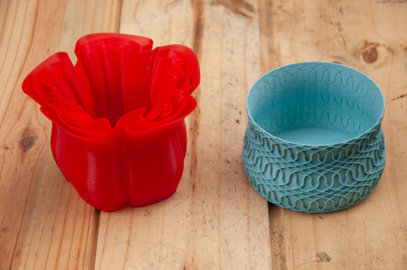 Ceramic cups on a wooden background. Selective focus.