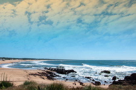 View of the Atlantic Ocean from the sandy beach in Uruguayの写真素材