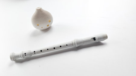 Musical instruments on a white background.Recorder and ocarinaの写真素材