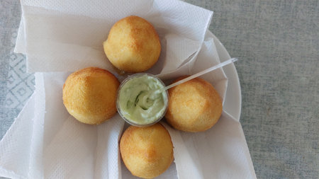 coxinhas with green mayonnaise, top view