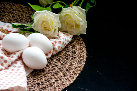 White eggs on the tableの写真素材