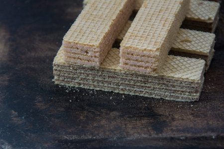 wafers on a wooden plate, closeup of photo.の写真素材