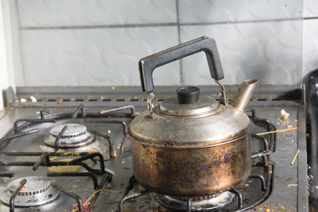 Cooking pot on the gas stove in the kitchen of the houseの写真素材