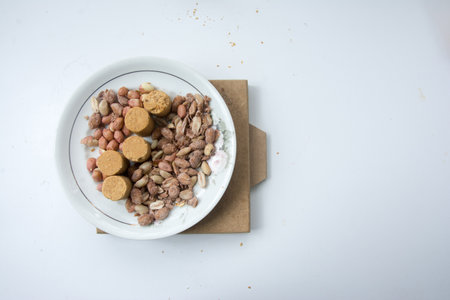 PaÃ§oca, Peanuts and Peanuts Praline on a white background. Close-up.
