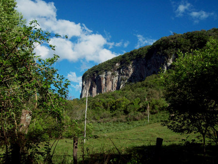 Landscape of a mountain and a blue sky with white clouds.の写真素材