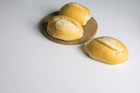 Close up of fresh bread on white background with copy space for text.