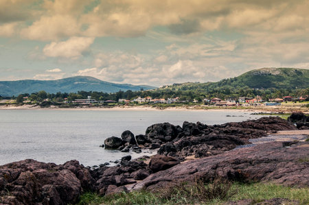 Beautiful landscape of the sea and mountains on a cloudy day. Uruguayの写真素材