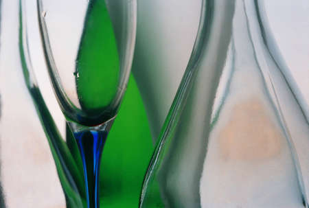 Beautiful composition from transparent glasswares stands against the windowの写真素材