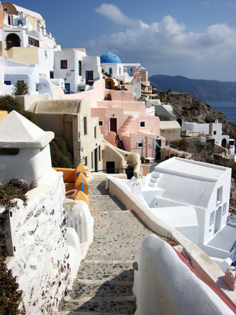 White and colourfull houses in a small village Santoriniの写真素材