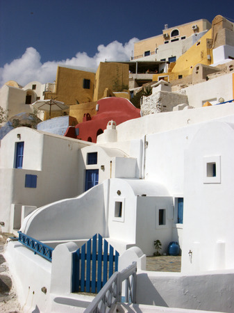 White and colourfull houses in a small village Santoriniの写真素材