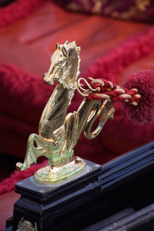 Traditional wooden boat Gondola in Venice close up and detailの写真素材